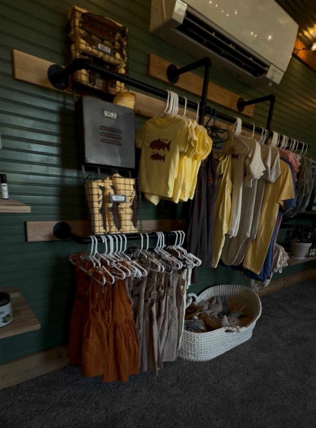 Children's clothes and gifts hanging in the store
